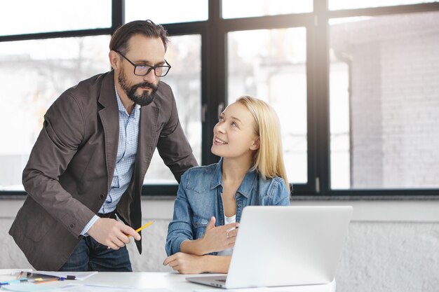 Business partners working in office