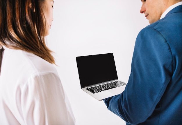 Business people in front of laptop