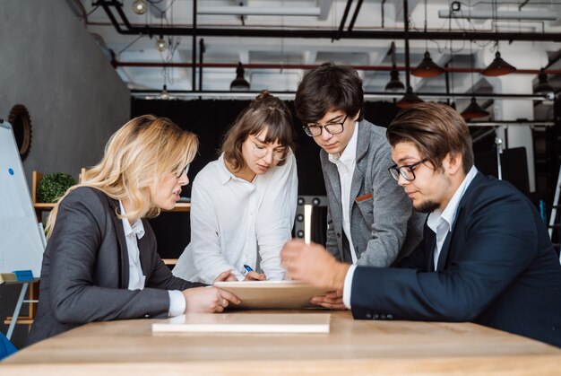 Business people having discussion on a document