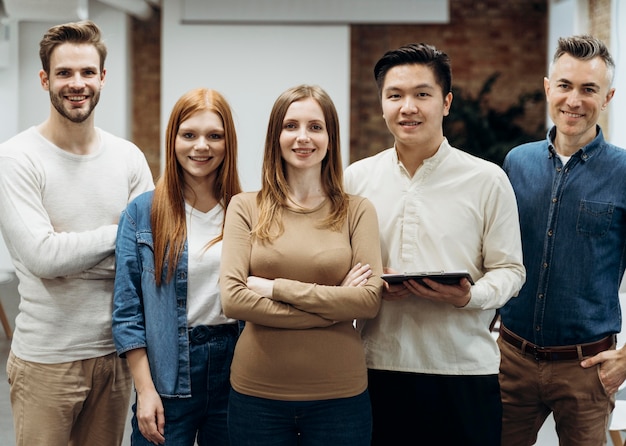 Business people posing together at the office