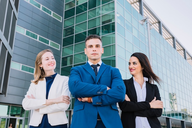 Business people with arms crossed