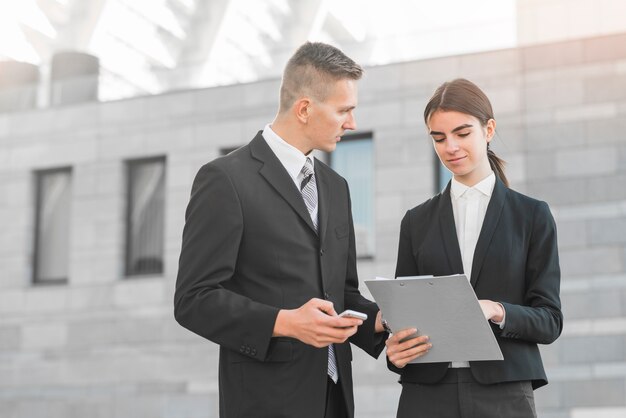 Business people with clipboard