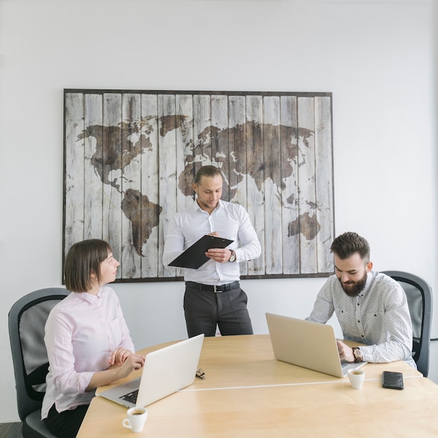 Free Photo business people working with laptop in office