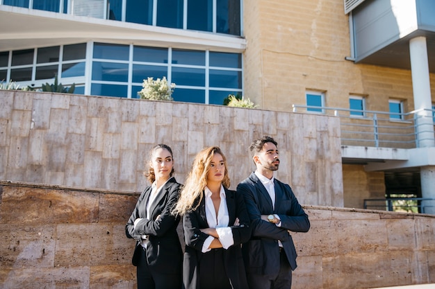 Business persons in front of stairs