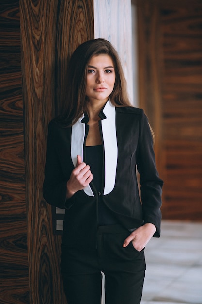 Free photo business woman in black suit