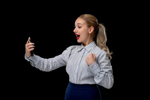 Business woman lovely excited girl talking on the video call with red lipstick in office costume