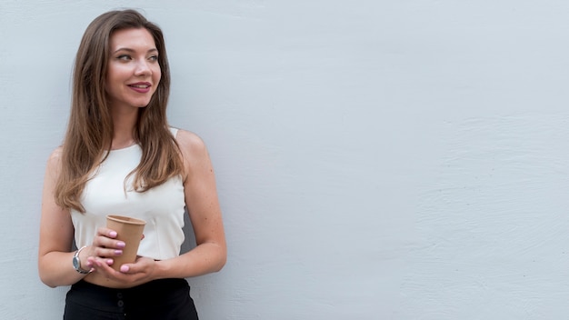 Free Photo business woman posing in the street