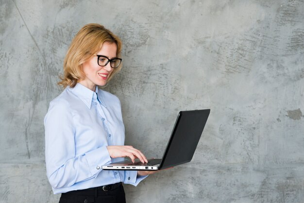 Business woman using laptop