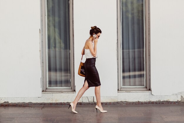 Business woman with mobile phone