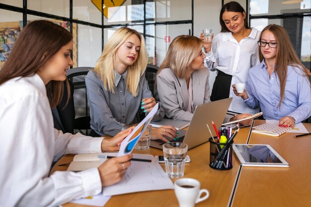 Business women meeting strategizing