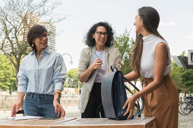 Business women taking a break outside