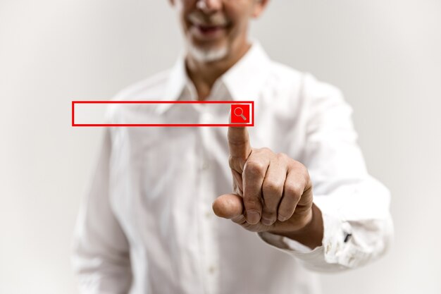 Businessman finger touching empty search bar, modern business concept