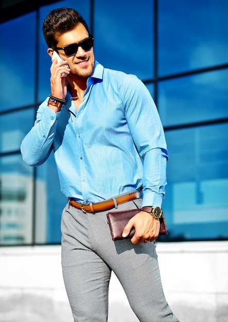 businessman in formal clothes and sunglasses