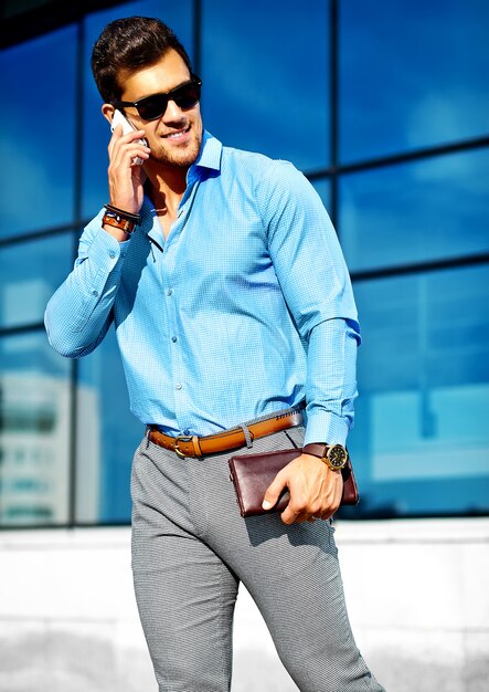 businessman in formal clothes and sunglasses