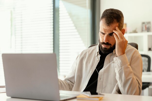 Businessman having a videocall for work