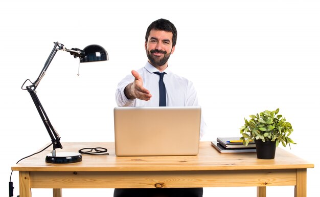 Businessman in his office making a deal