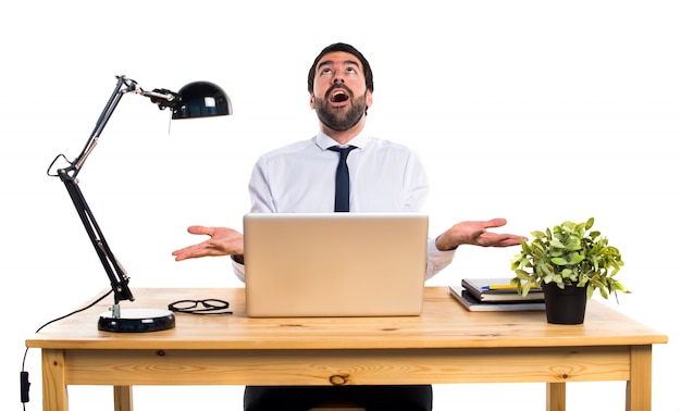 Businessman in his office pleading