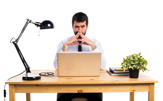 Businessman in his office thinking