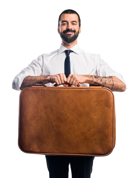 Free photo businessman holding a briefcase