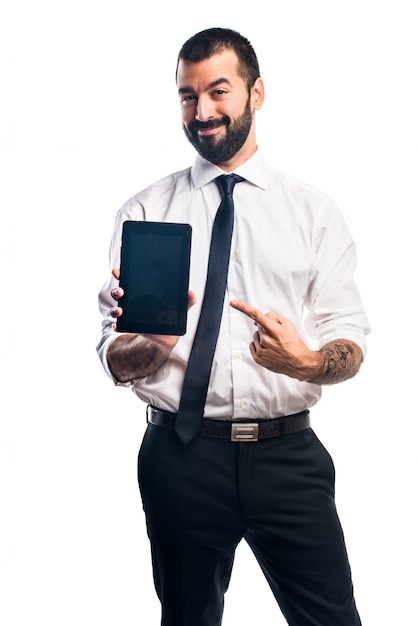 Free photo businessman holding a tablet