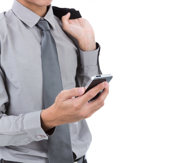 Businessman looking at his cellphone