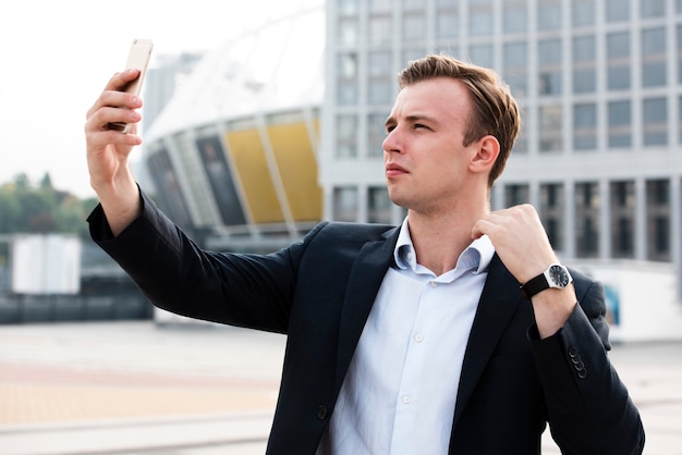 Businessman looking at phone