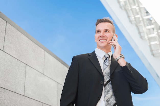 Businessman making phone call