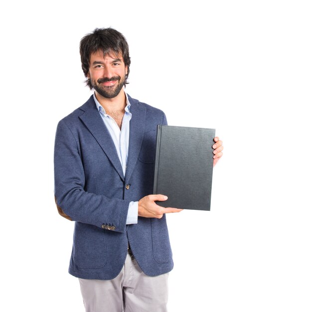 Businessman reading a book over white background