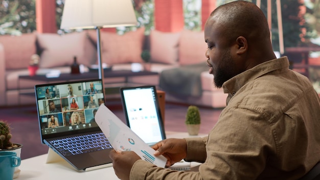 Businessman reviewing the financial reports with the shareholders