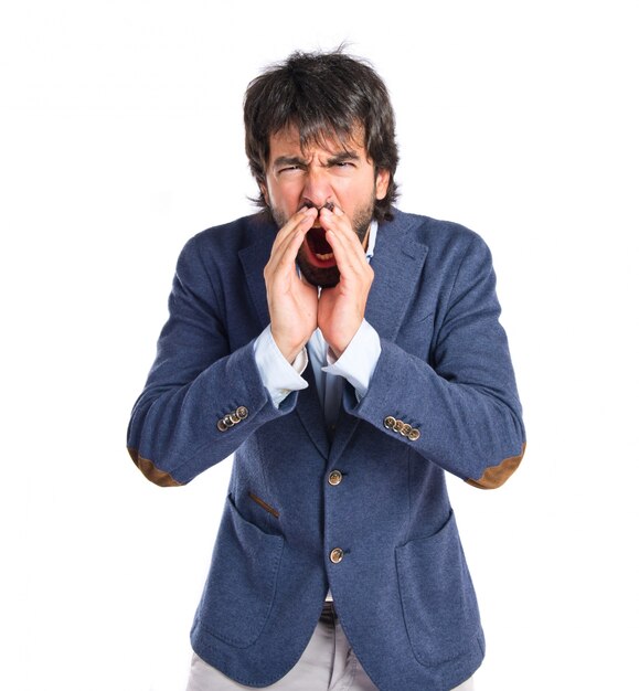 Businessman shouting over isolated white background