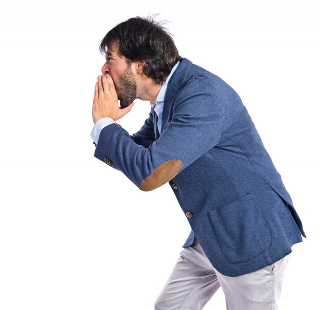 Businessman shouting over isolated white background