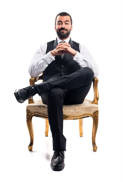 Businessman sitting on armchair