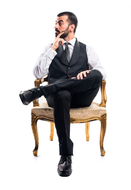 Businessman sitting on armchair