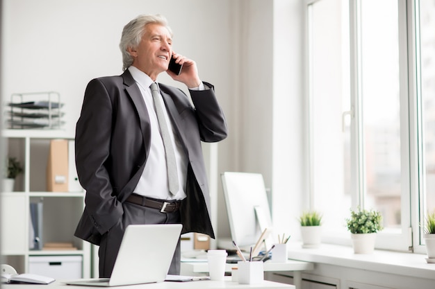 Businessman talking by phone