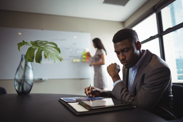 Businessman using digital tablet