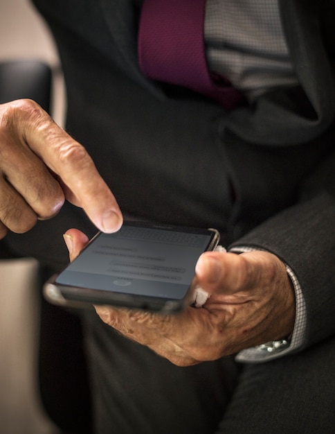 Businessman using his mobile phone