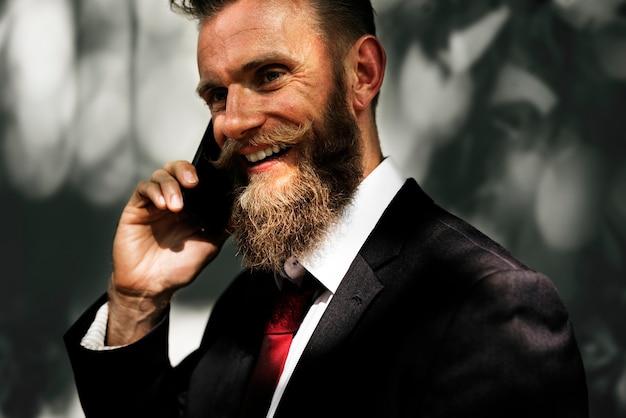 Businessman using mobile phone communication technology