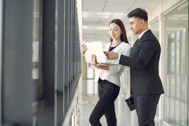 Businessman with his partner working in a office