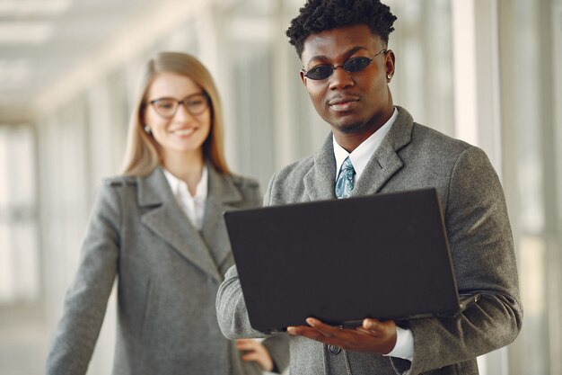 Businessman with his partner working in a office