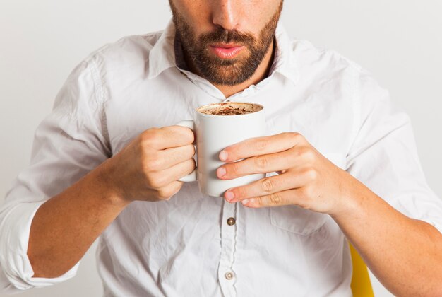 Businessman with hot coffee