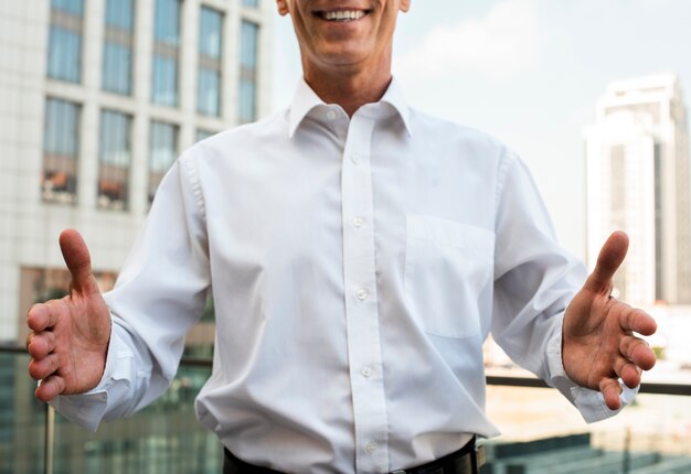 Businessman with palms facing each other