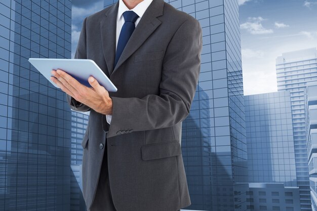 Businessman with suit and tablet