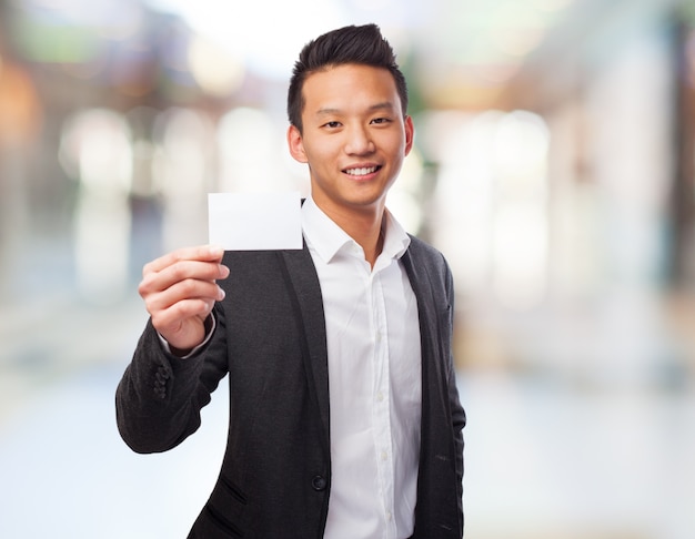 Businessman with a white card