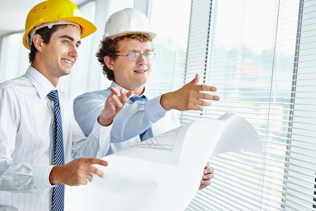 Businessmen checking a sketch