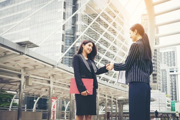 Businessmen handshake with workmate,Handshake business partner work deal together.