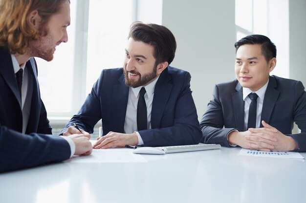 Businessmen joking in the interview