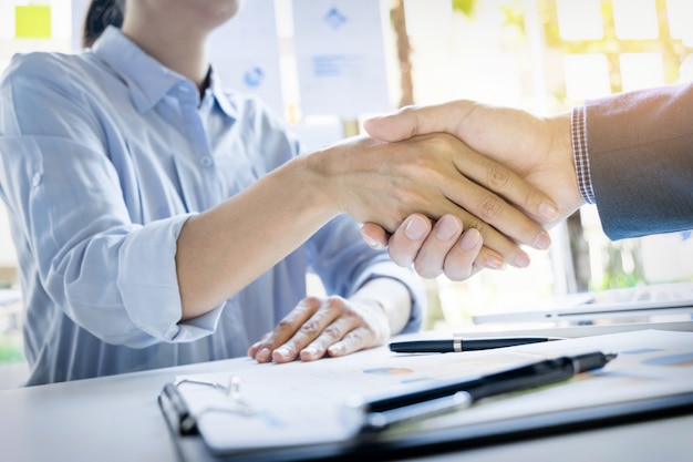 Businessmen shaking hands during a meeting