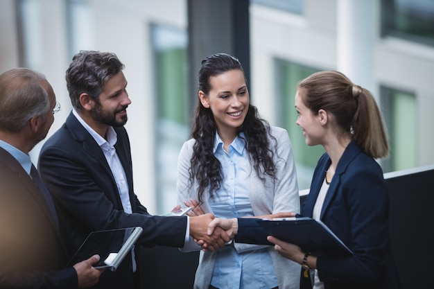 Businesspeople having a discussion in office