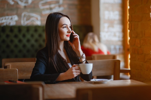 Businesswoman in a cafe