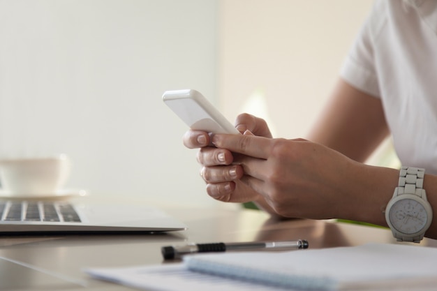 Free Photo businesswoman looking important contact on phone